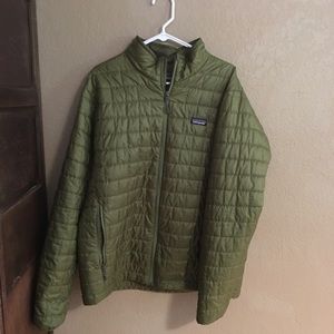Men’s Nano Puff jacket in green.